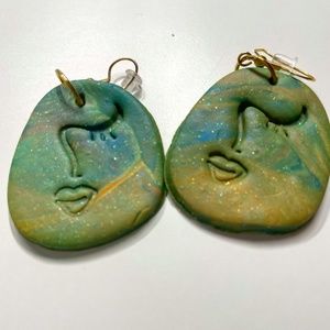 "Expressions in Clay: Captivating Face Earrings for Every Style"